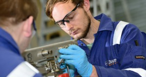 3sun Group technician overhauling an Oil and Gas Drawer Control Module.