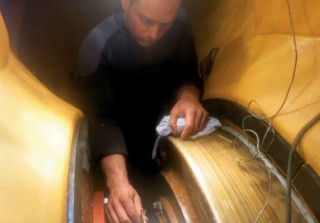 Hydrex diver working on the assembly inside the flexible mobdock.