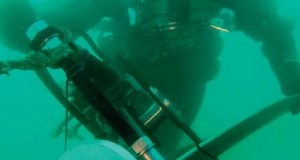 Hydrex divertechnician cropping a damaged propeller blade underwater