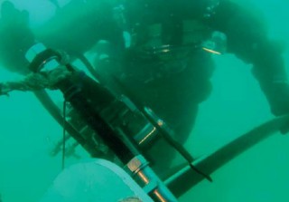 Hydrex divertechnician cropping a damaged propeller blade underwater