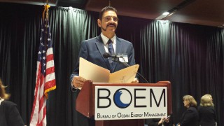 BOEM's GOM Region Director John Rodi reading bids at Lease Sale 238.