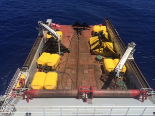 Anchor handling vessel loaded with DSM mooring equipment