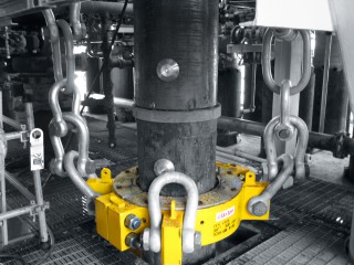 A Claxton conductor tension ring securing a conductor during a slot recovery operation